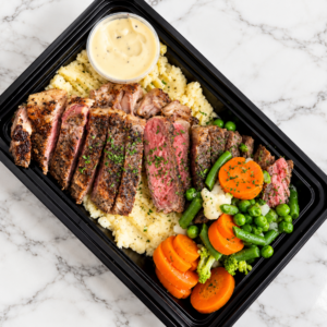 Sirloin Steak, Creamy Mash & Potatoes, Country Veg & Peppercorn Sauce